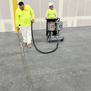 Two workers filling cracks with the portable AST GMP-025 unit