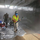 Worker using the AST GMP-050-Spray dispensing wand