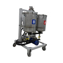 Front view of the AST GMP 075-I, featuring labeled "A" and "B" stainless steel tanks, metering pumps, and a mobile frame with caster wheels.