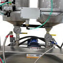 Close-up of the AST GMP 075-I’s pressure gauges, fluid valves, and stainless steel piping for precise material dispensing control.