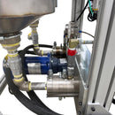 Close-up of the AST GMP 075-I’s motorized pump system, showing fluid connections, braided hoses, and stainless steel components.