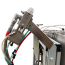 Precision dispensing wand of the AST GMP 075-I, featuring fluid control valves, braided hoses, and stainless steel fittings.