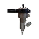 Close-up of the AST SE-5 dispensing valve, showing the stainless-steel construction and material outlet fitting for precise adhesive dispensing.