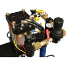 Close-up of HG 250H dispensing components including air regulator, pressure relief valve, and pneumatic fluid controls.