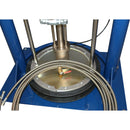 Close-up of the HG 350H 55-gallon dispensing system base with coiled stainless steel hose for high-viscosity adhesive transfer.