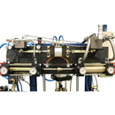 Close-up view of the HG 437 system’s dual metering cylinders and pressure gauges for high-viscosity adhesive dispensing.