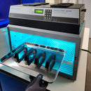 Person removing parts from the Uvitron IntelliRay Quad