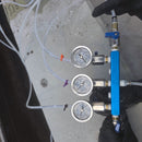 Pressure gauges and manifold on AST RMP 317-C epoxy injection machine for concrete repair