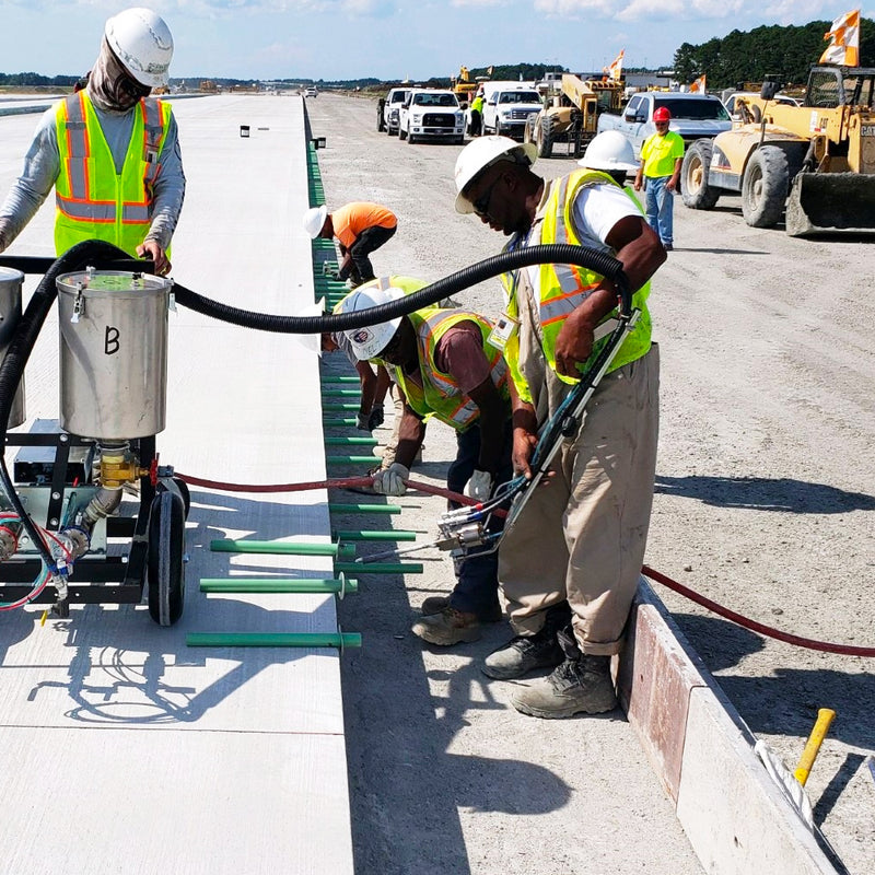 Dowel and road construction epoxy dispensing system