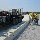 Dowel and road construction epoxy dispensing using the AST RMP-624
